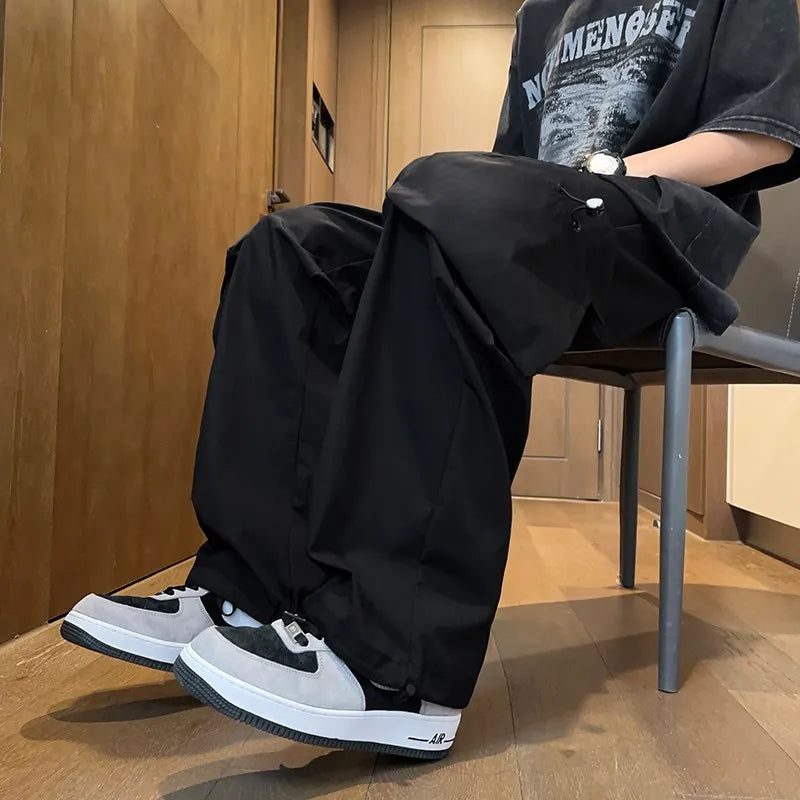 Trendy Men's Cargo Pants Loose Fit American Sle Summer Spring Low Waist Trousers for Casual Wear Modern Wind PU Material